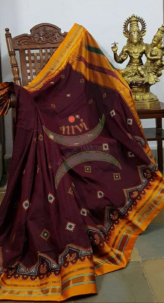 Maroon ilkal silk cotton with mustard border and peacock motif kasuti embroidery.