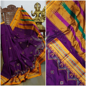 Purple ilkal silk cotton with mustard border and peacock motif kasuti embroidery.