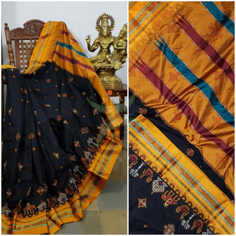 Black ilkal silk cotton with mustard border and anne ambari motif kasuti embroidery.