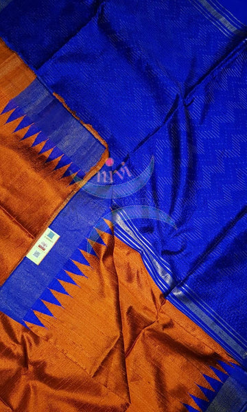 Rust orange handloom pure raw silk tussar with temple border in contrasting royal blue and zigzag lines on pallu.
