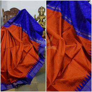 Rust orange handloom pure raw silk tussar with temple border in contrasting royal blue and zigzag lines on pallu.