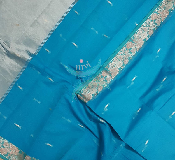Blue cotton blend 1000 butta saree with tissue pallu.