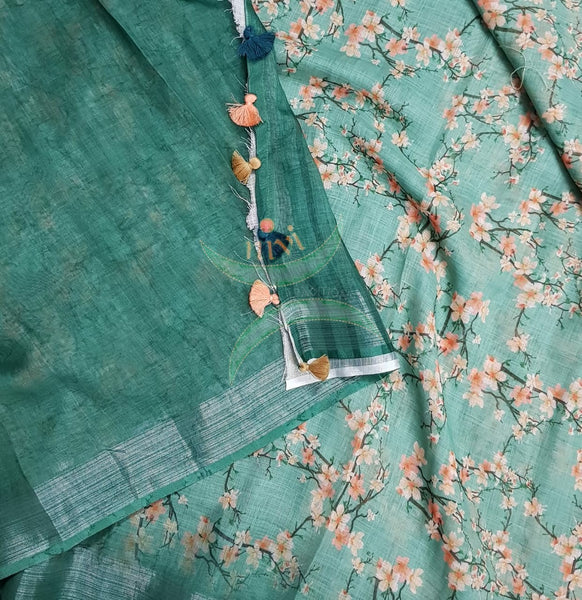 Sea green digital printed linen saree.