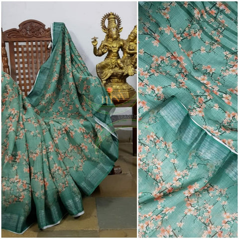 Sea green digital printed linen saree.