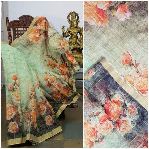 Pastel green digital printed linen saree with contrasting blouse piece