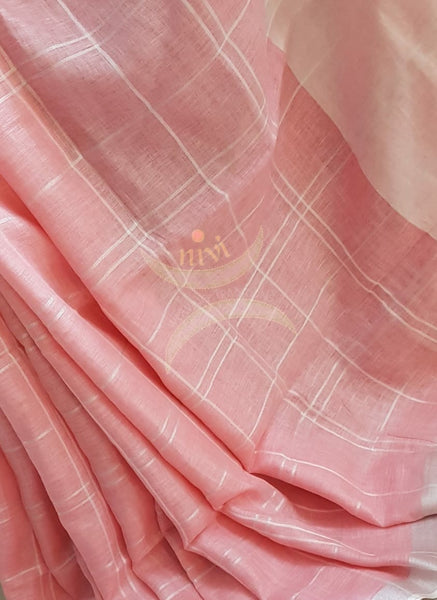 Pink handloom linen with subtle silver zari checks and border.