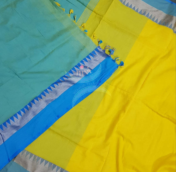 Yellow handloom cotton soft drape with contrasting sea blue temple border, pallu and blouse.