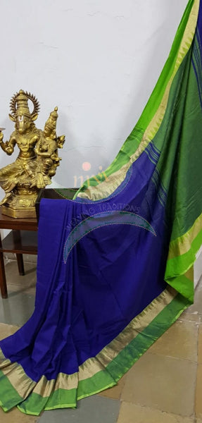 Royal blue handloom cotton soft drape with contrasting green temple border, pallu and blouse.
