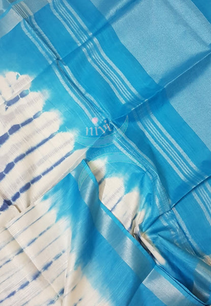 White and blue shibori linen