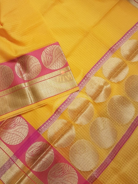 Tumeric yellow silk cotton Benares brocade with antique gold zari motif on border and pallu 