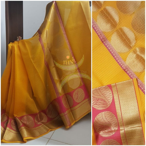 Tumeric yellow silk cotton Benares brocade with antique gold zari motif on border and pallu 