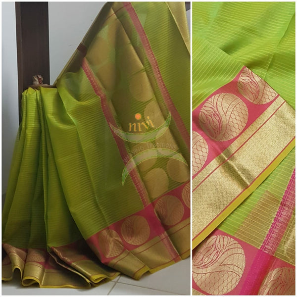 Green silk cotton Benares brocade with antique gold zari motif on border and pallu