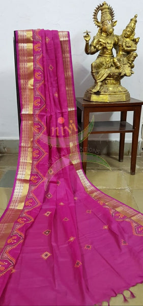 Pink kota cotton dupatta with machine kasuti embroidery.