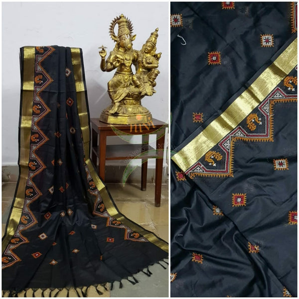 Black kota cotton dupatta with machine kasuti embroidery.