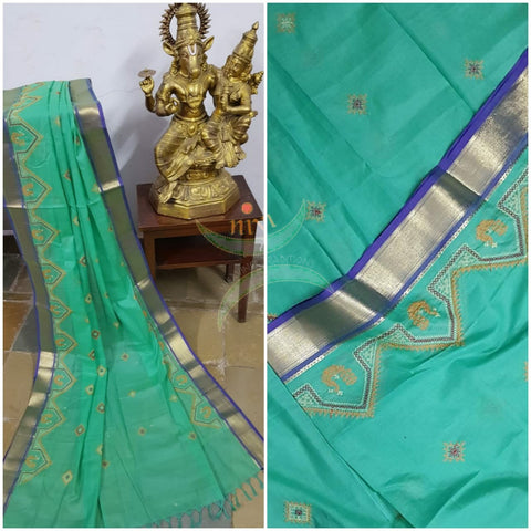 Sea green kota cotton dupatta with machine kasuti embroidery.