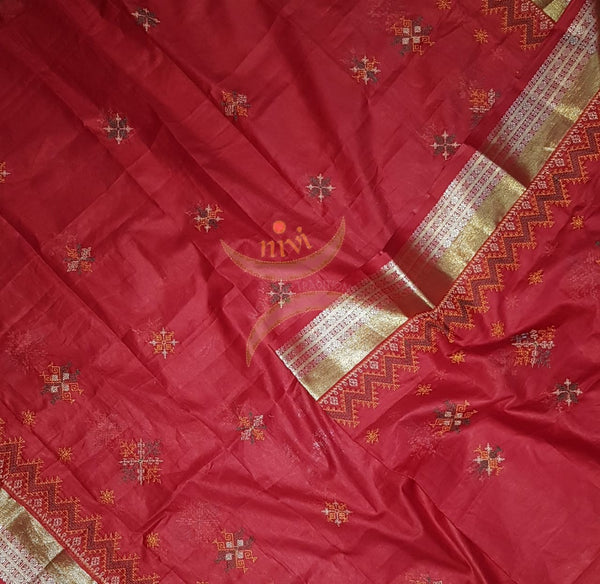Red kota cotton dupatta with machine kasuti embroidery.