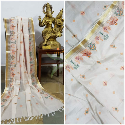 Off white kota cotton dupatta with machine kasuti embroidery.