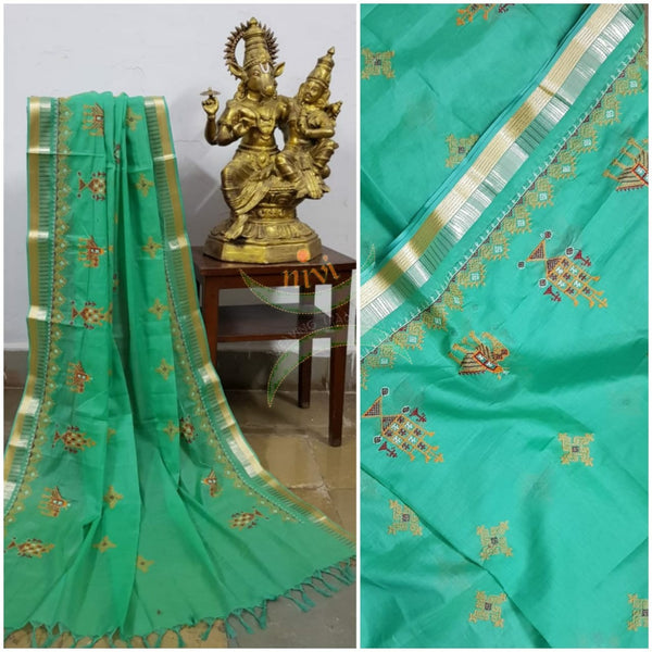 Sea green kota cotton dupatta with machine kasuti embroidery.