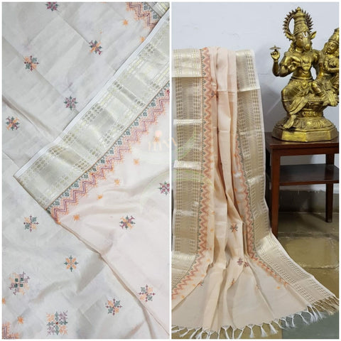 Beige kota cotton dupatta with machine kasuti embroidery.