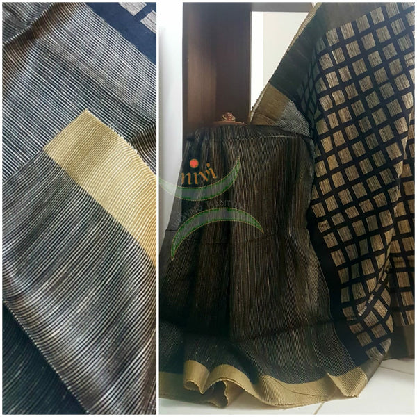 Black Pure dupion silk with striped body and checks pallu.