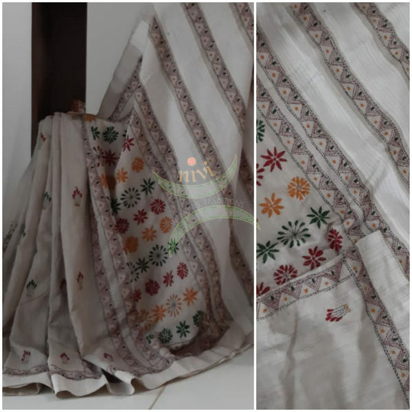 Beige linen Saree with hand kantha embroidery.