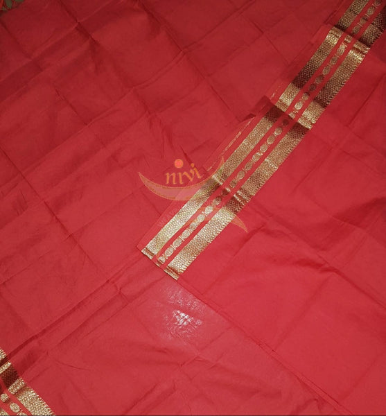 Dark peach kota cotton dupatta with subtle gold borders.