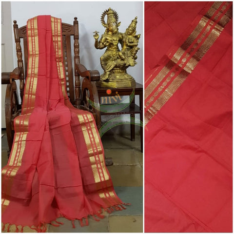 Dark peach kota cotton dupatta with subtle gold borders.