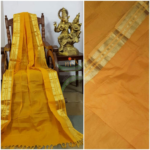 Mustard yellow kota cotton dupatta with subtle gold borders.