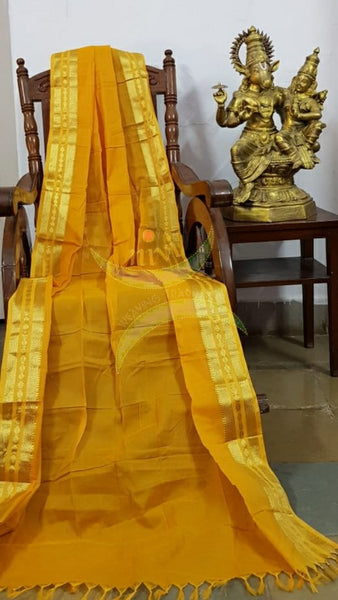 Mustard yellow kota cotton dupatta with subtle gold borders.