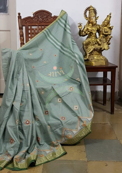 Mint green kota cotton with traditional peacock motif kasuti embroidery