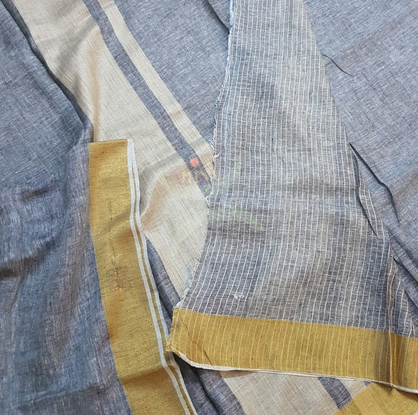 Grey handloom linen cotton with contrasting gold border and blouse piece.