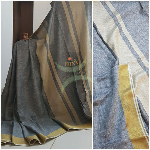 Grey handloom linen cotton with contrasting gold border and blouse piece.
