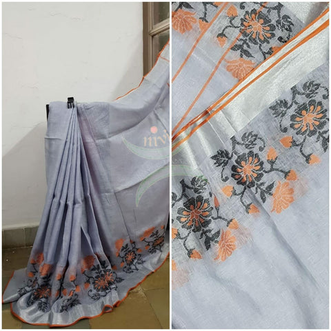 Grey handloom linen with contrasting orange border woven with floral motif and striped pallu