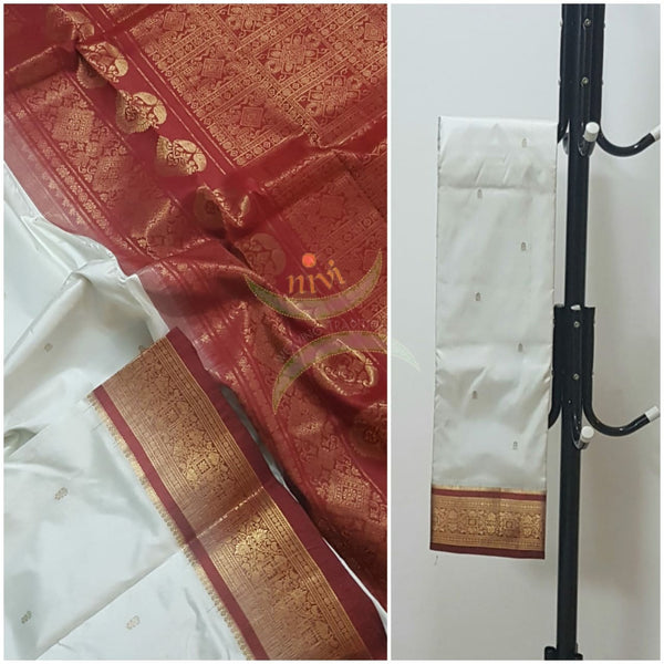 Off white handloom pure silk kanjeevaram with contrasting red border and pallu