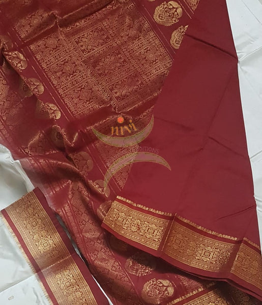 Off white handloom pure silk kanjeevaram with contrasting red border and pallu