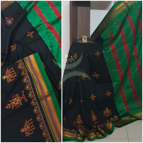 Black silk cotton ilkal with traditional anne ambari motif kasuti embroidery and Green tope teni pallu. Saree comes with running blouse.