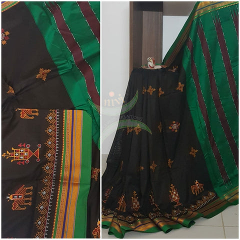 Dark Brown silk cotton ilkal with traditional anne ambari motif kasuti embroidery and Green tope teni pallu. Saree comes with running blouse.