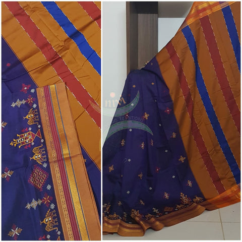 Royal blue cotton blended ilkal with traditional anne ambari motif kasuti embroidery and mustard tope teni pallu. Saree comes with running blouse.
