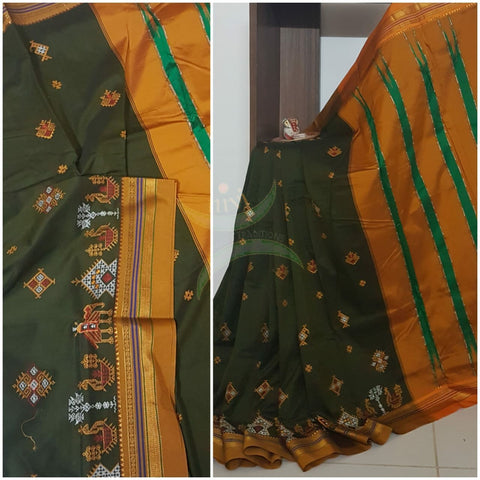 Mehendi green  silk cotton ilkal with traditional anne ambari gopura motif kasuti embroidery and mustard tope teni pallu. Saree comes with running blouse.