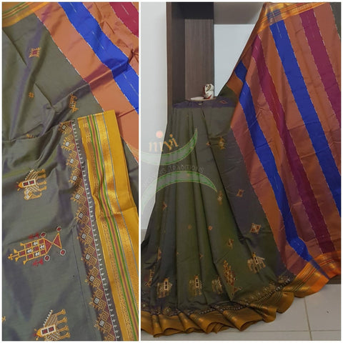 Grey cotton blended ilkal with traditional anne ambari motif kasuti embroidery and mustard tope teni pallu. Saree comes with running blouse.