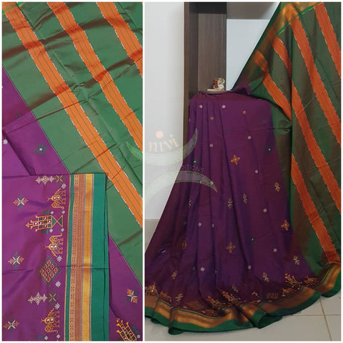 Purple cotton blended ilkal with traditional anne ambari motif kasuti embroidery and green tope teni pallu. Saree comes with running blouse.