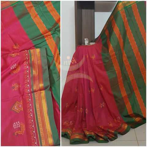Pink cotton blended ilkal with traditional gopura motif kasuti embroidery and green tope teni pallu. Saree comes with running blouse.