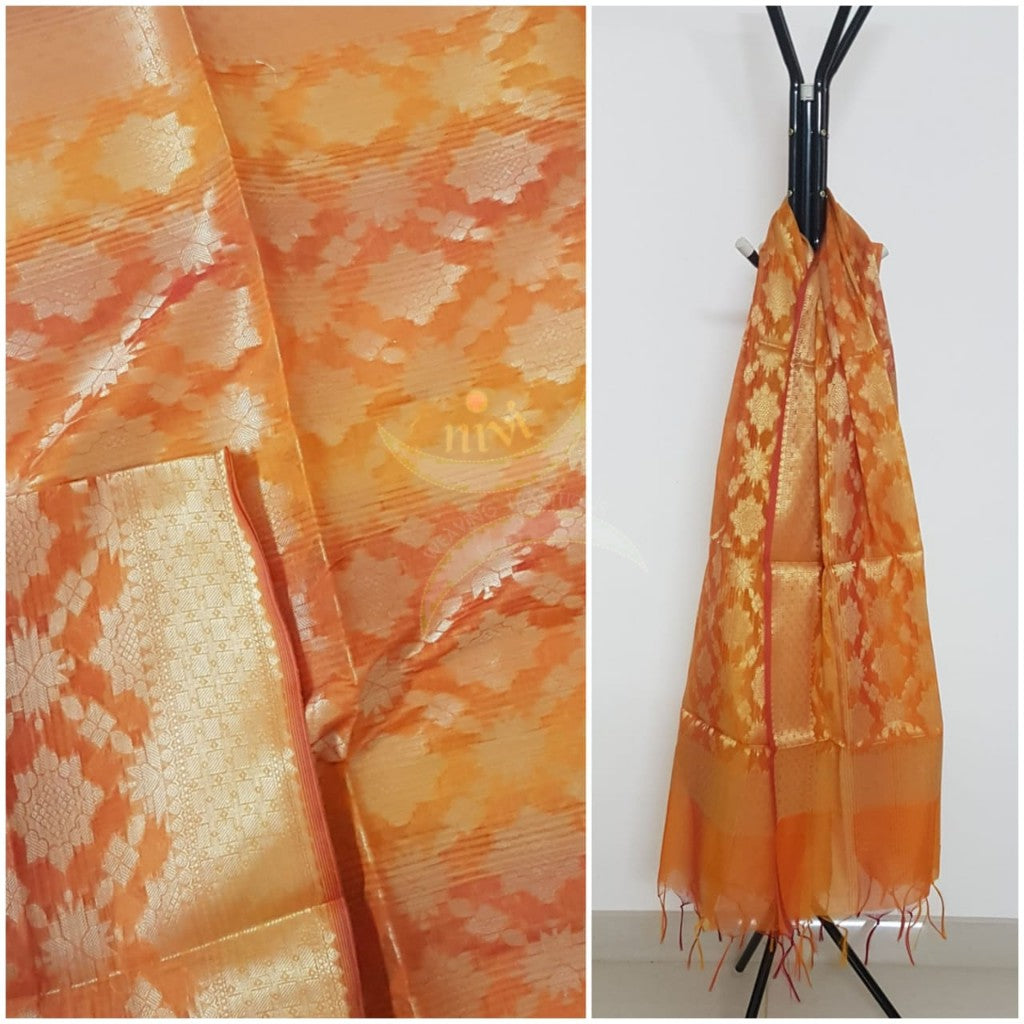 Two tone yellow orange chenderi benaras brocade duppata with all over jacquard weaving.