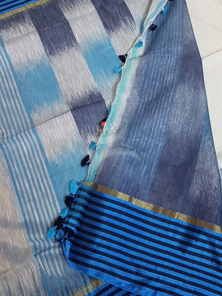 Off white bengal handloom cotton with checked border and ikat pallu