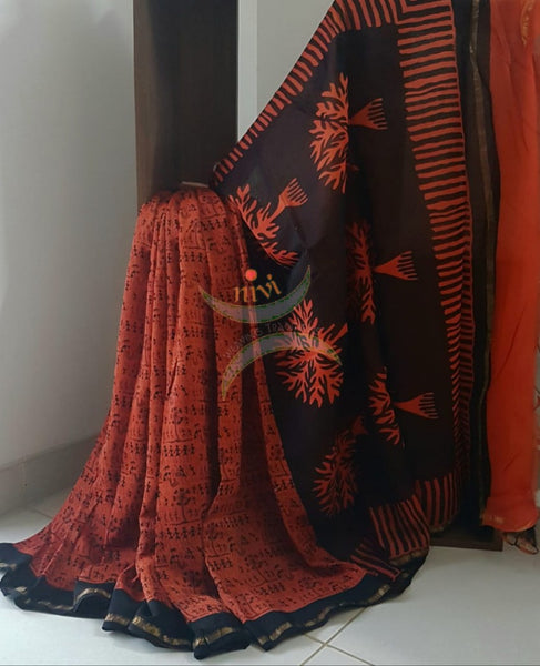 Orange Handloom chanderi hand block printed saree with warli art. Saree comes with warli printed blouse piece 