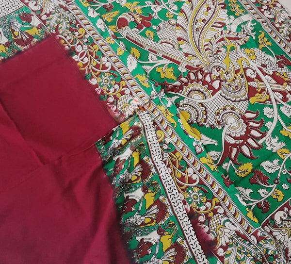 Red mul cotton handloom kalamkari Saree with human figure motifs on border and peacock motif on pallu. Saree comes with kalamkari printed blouse piece.