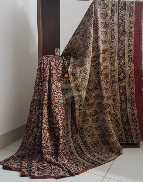 Red chennur silk handloom kalamkari Saree. Saree comes with printed blouse piece.