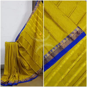 Yellowish green mercerised South cotton with contrasting blue woven temple border