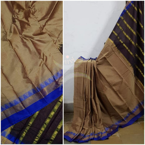 Dark beige mercerised South cotton with contrasting blue woven temple border