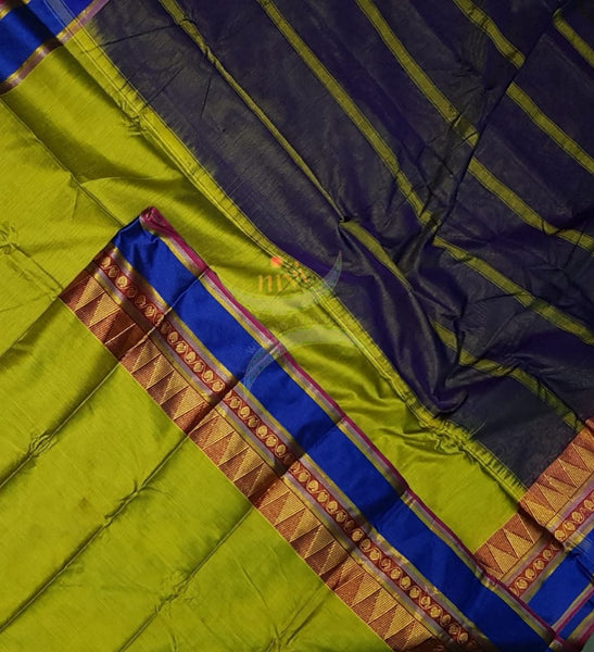 Green mercerised South cotton with contrasting blue woven temple border
